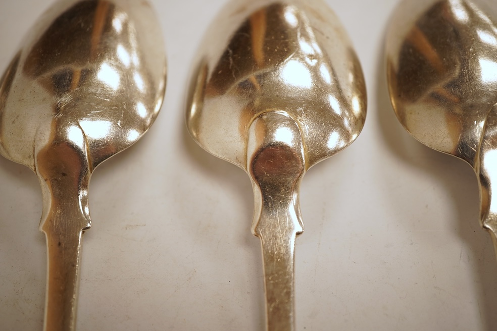 A matched set of six George III silver fiddle pattern table spoons, including four by Eley, Fearn and Chawner, London, 1820 and two London, 1808, 14.2oz.